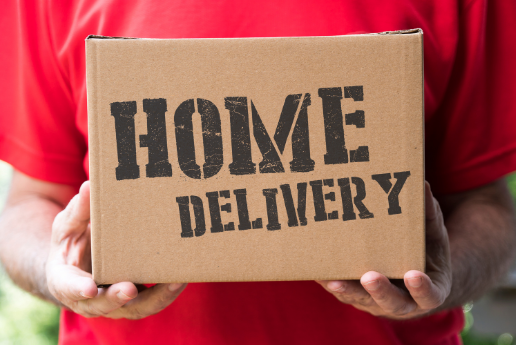 a person holding a box with text: home delivery