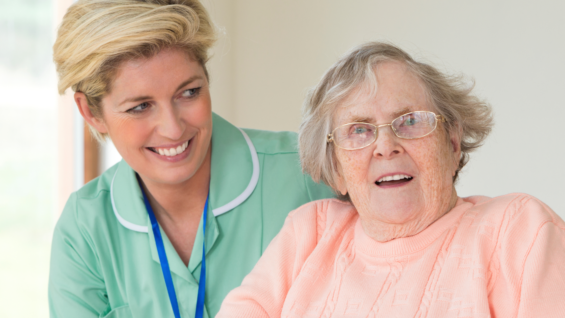 Female carer with a senior service user