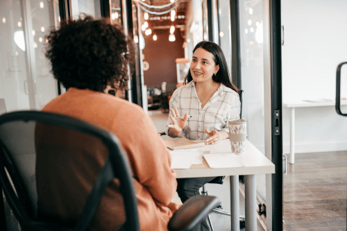 a photo of a recruiter interviewing a candidate