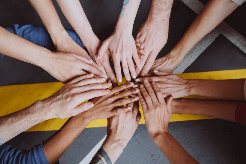 a photo of teamwork hands